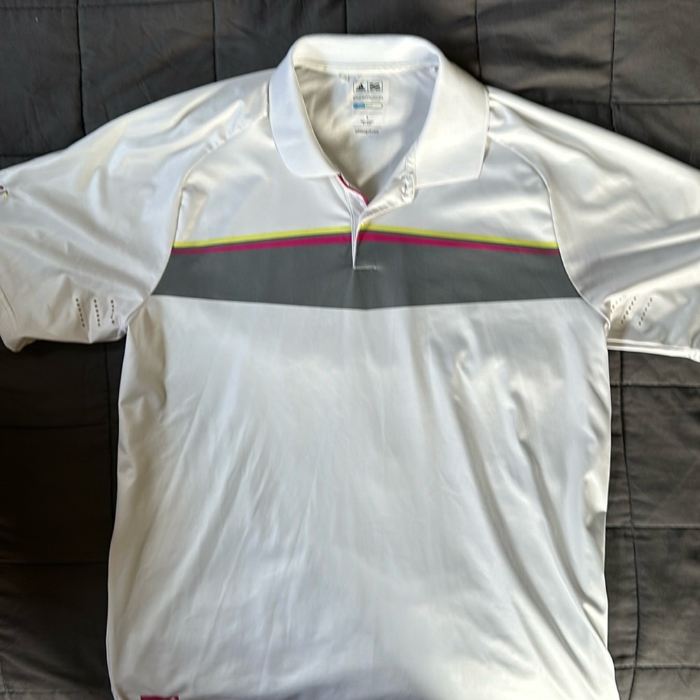 Adidas Puremotion golf polo with Buffalo Hill’s Golf Course on right sleeve.